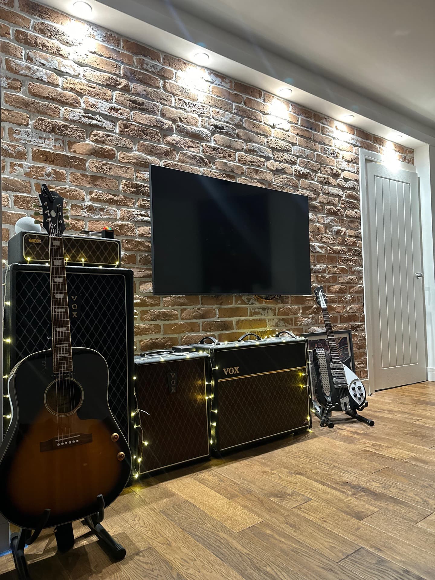 Contemporary lighting fixture installation in residential space